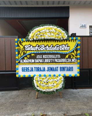 Papan Bunga Duka di Merigi Sakti